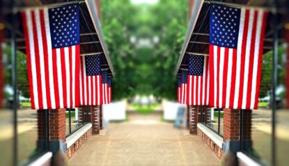 Displaying flags along walkways